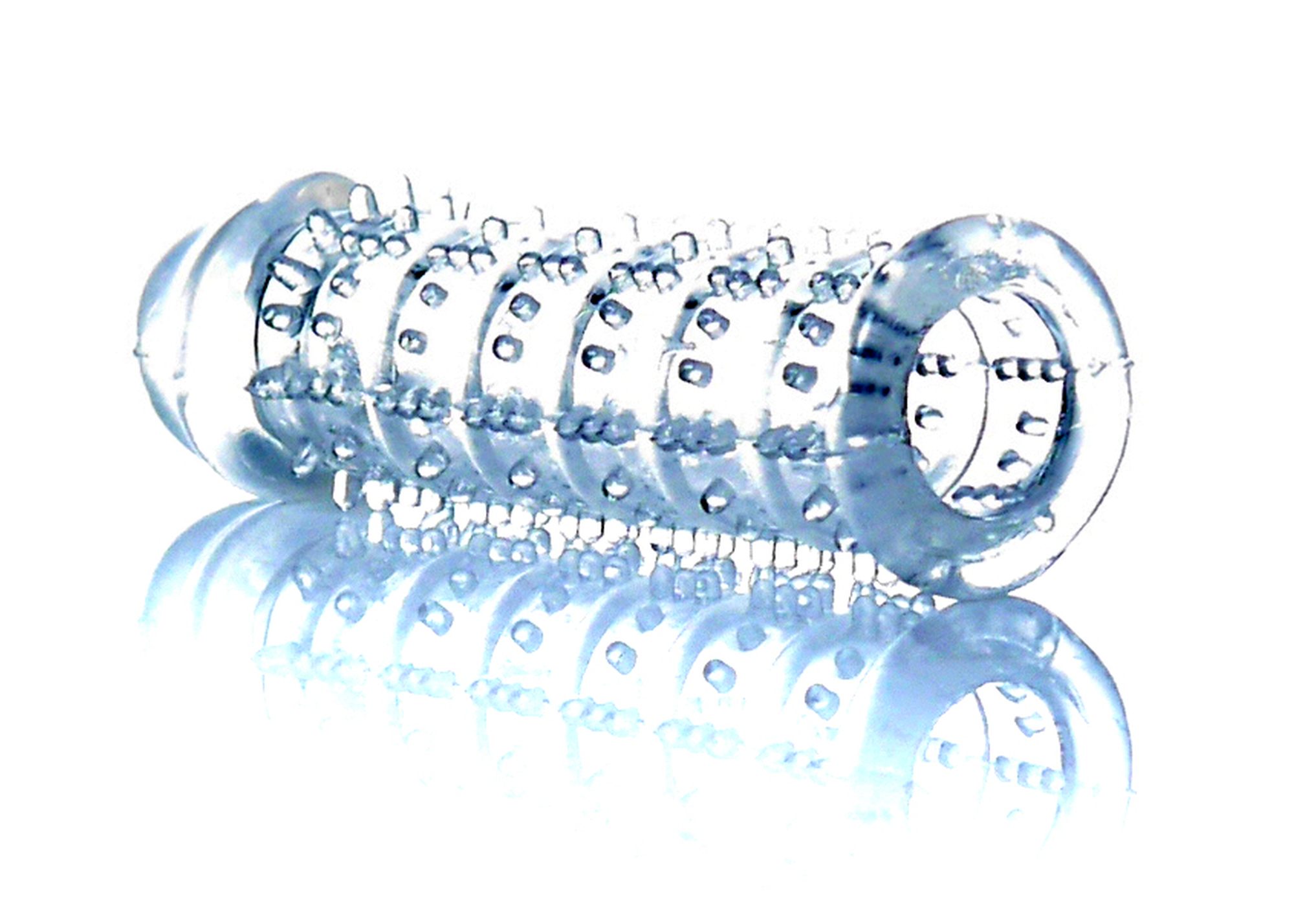 Stimulator Penis Sleeve cu tepi si cap Transparent, detaliu al tepilor si texturii de pe suprafata