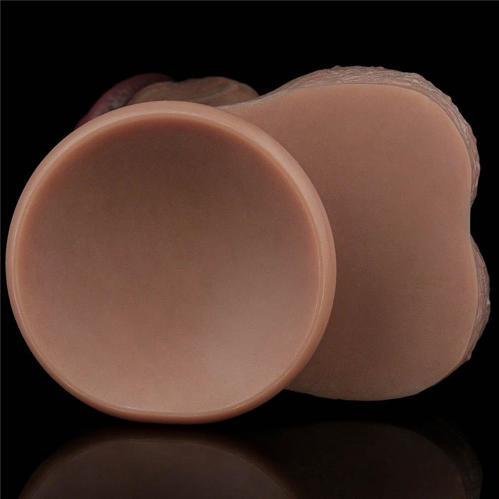 Sectiune transversala a dildo-ului Nature Cock 13 inch, aratand cele doua straturi de silicon: exterior moale si miez ferm interior