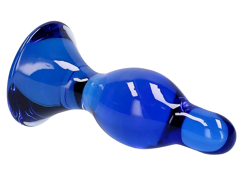Butt plug din sticla Chrystalino Classy Blue, culcat, cu baza evazata vizibila din profil