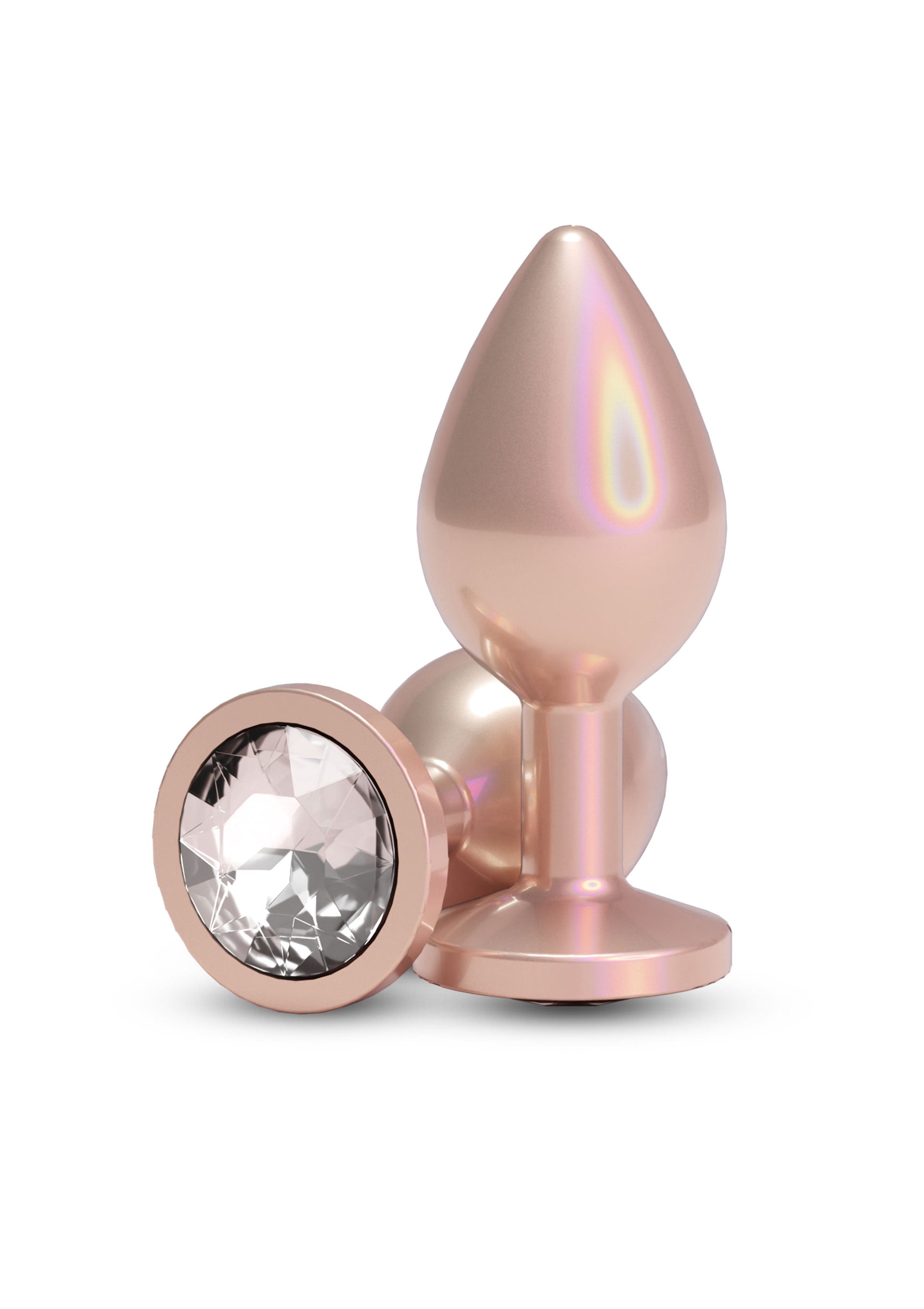 Doua plug-uri anale din aluminiu irizant Roz Auriu, unul in picioare cu varful conic vizibil, celalalt culcat aratand baza cu cristal fatetat transparent
