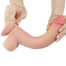 Dildo-ul Lovetoy Sliding Skin 9 inch curbat, cu pielea culisanta trasa simultan, demonstrand flexibilitatea totala