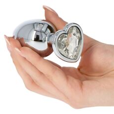 Plug anal Toyz4Lovers Heart Jewel, cristal transparent in forma de inima, tinut in mana