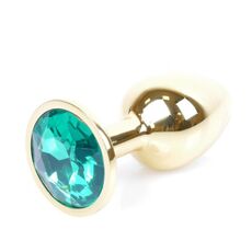 Plug Jewellery Gold, cristal verde, vedere de aproape cu suprafata metalica lustruita si cristalul fatetat