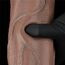 Deget apasat in tija dildo-ului Nature Cock 13 inch, aratand cedarea controlata a materialului dual-layer