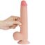 Deget apasat in tija dildo-ului Lovetoy Sliding Skin 9 inch, aratand moliciunea stratului exterior