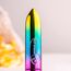 Mini Vibrator Rocks Off RO-80mm Rainbow, prim-plan cu fundal floral neclar
