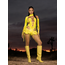 Bodysuit Asimetric Decupat Galben Leg Avenue, campanie foto stilizat cu ciorapi fishnet si cizme