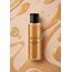 Ulei de masaj Sensual Golden Shimmer by Geisha, vedere de sus cu texturile aurii in suspensie