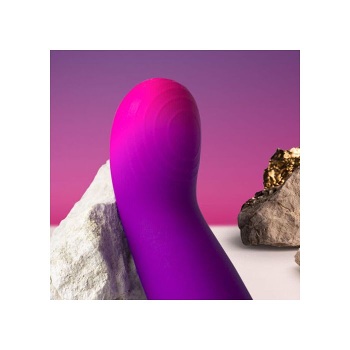 Vibrator Punct G Rocks Off Glo-Girl Vibe, prim-plan langa pietre decorative
