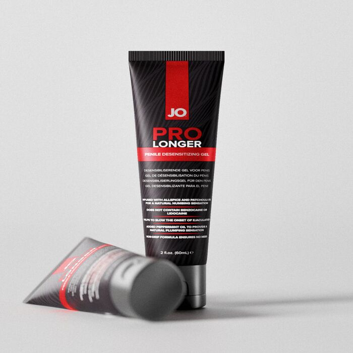 Tuburi System JO Prolonger Gel, unul asezat pe fundal deschis